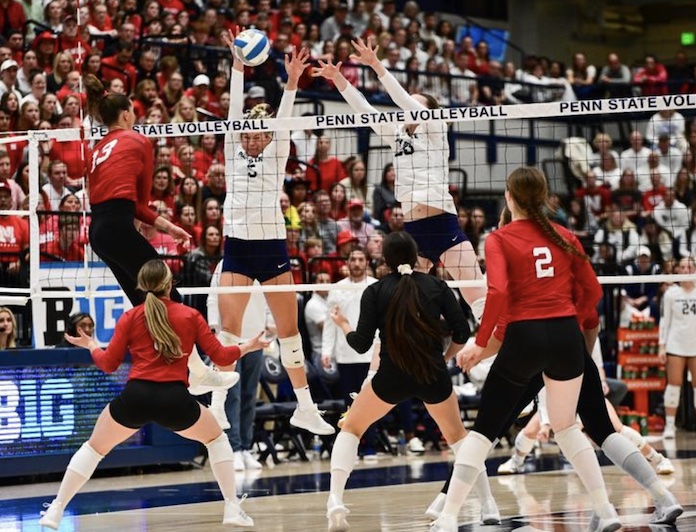 Penn State's Mac Podraza and Allie Holland block Nebraska's Merritt Beason